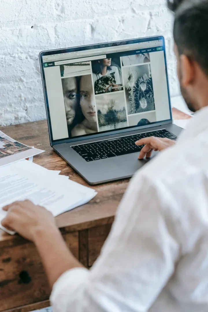 picture of man working on laptop